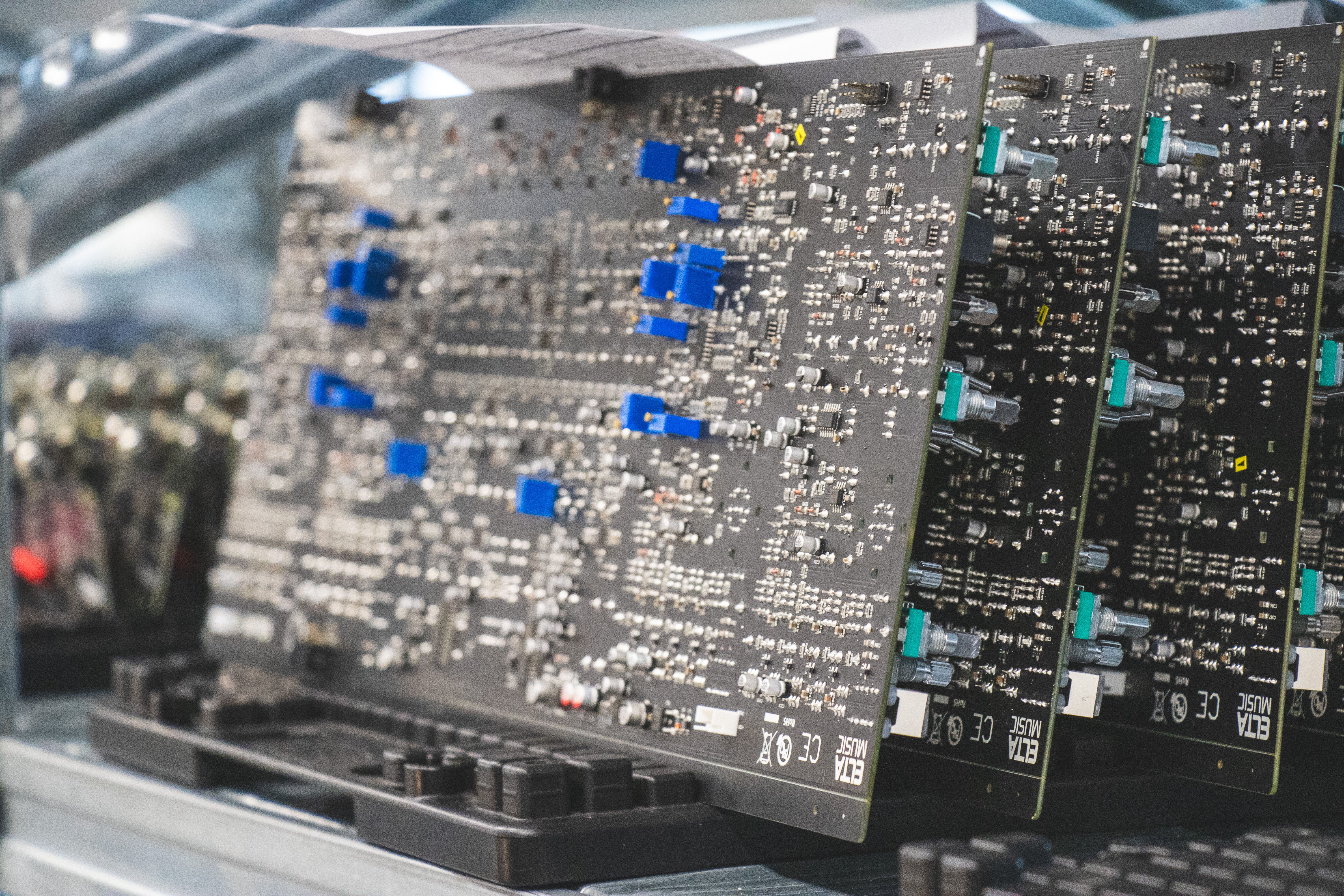 Close up of a rack of Printed Circuit Boards