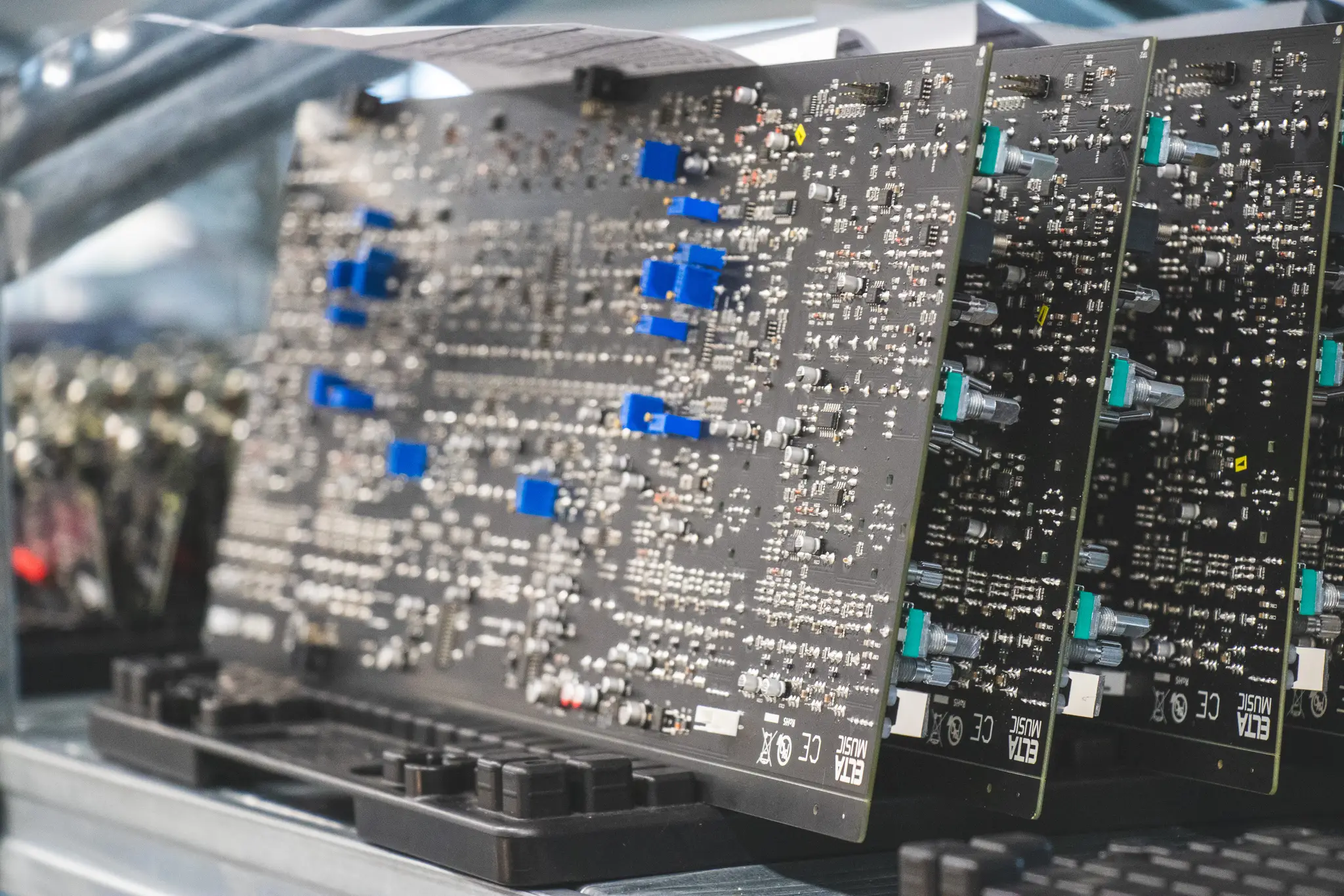 Close up of a rack of Printed Circuit Boards